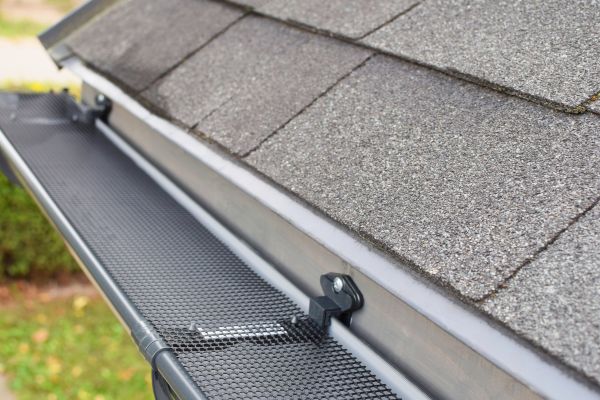 Rain Gutter Cover Installation in Brick